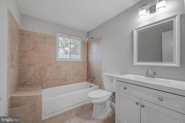 bathroom featuring vanity, shower / tub combination, tile patterned flooring, and toilet