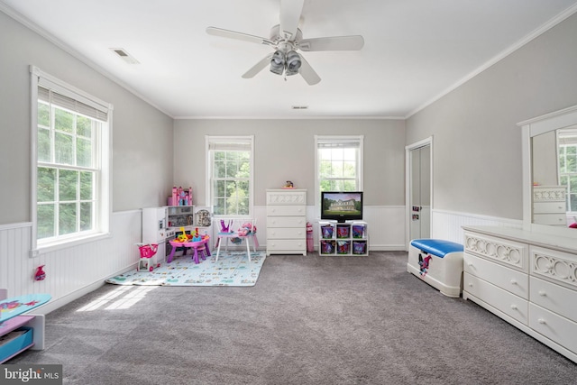 rec room featuring a wainscoted wall, carpet, and visible vents