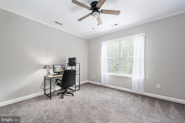 home office with ornamental molding, carpet flooring, visible vents, and baseboards