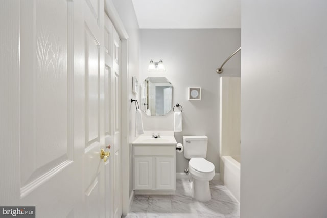 full bath featuring marble finish floor, tub / shower combination, vanity, and toilet