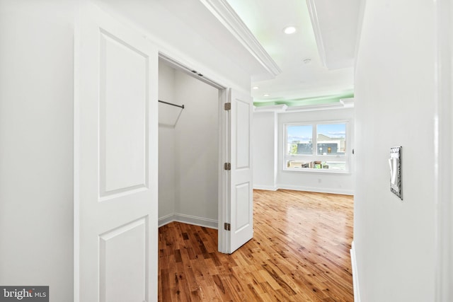 interior space featuring baseboards, light wood-style flooring, and recessed lighting