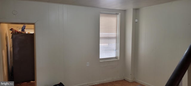 empty room with baseboards