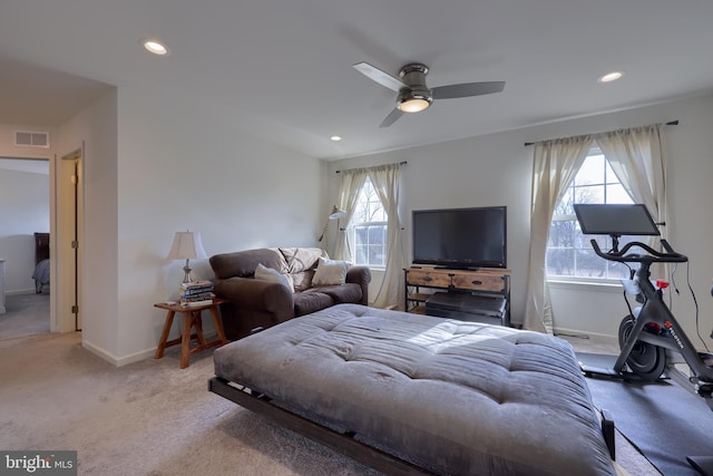 carpeted living room featuring baseboards, visible vents, ceiling fan, and recessed lighting