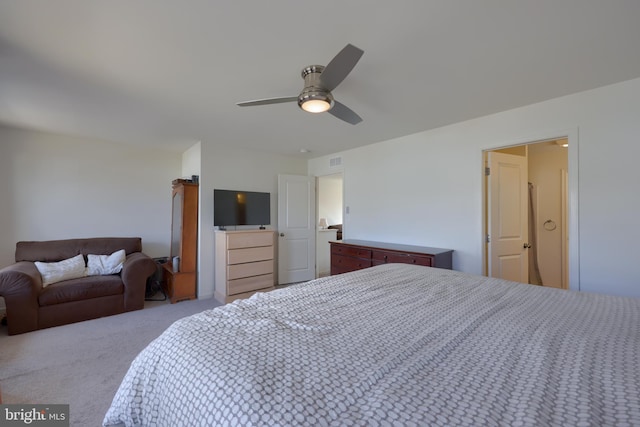 carpeted bedroom with ceiling fan and visible vents