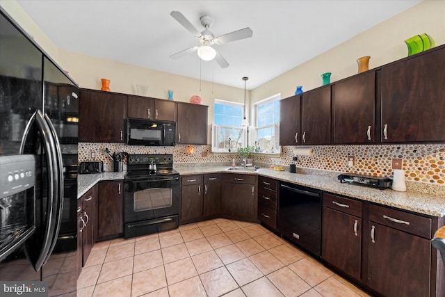 kitchen featuring light tile patterned floors, ceiling fan, dark brown cabinetry, backsplash, and black appliances