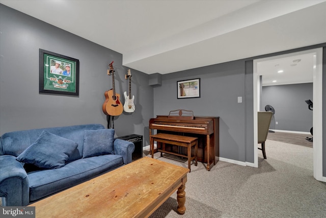 living room with carpet, baseboards, and recessed lighting