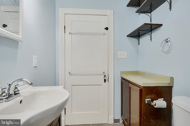 bathroom featuring a sink and toilet
