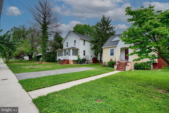 view of front of home with a front yard