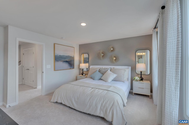 bedroom with carpet floors, radiator heating unit, recessed lighting, and baseboards