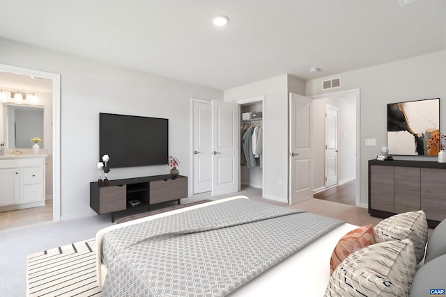 bedroom with light colored carpet, a sink, visible vents, baseboards, and ensuite bath