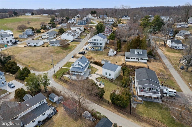 birds eye view of property with a residential view