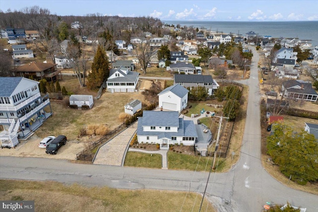 aerial view featuring a residential view and a water view