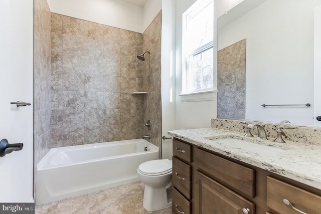 full bathroom featuring tub / shower combination, vanity, and toilet