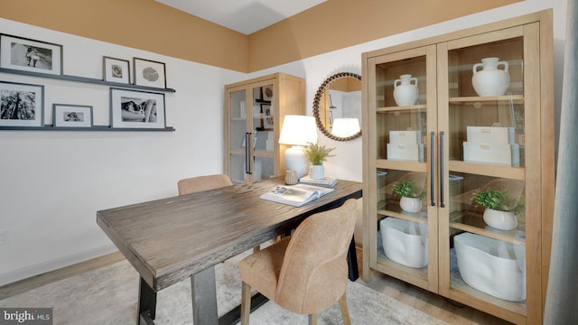 home office featuring light wood-style flooring