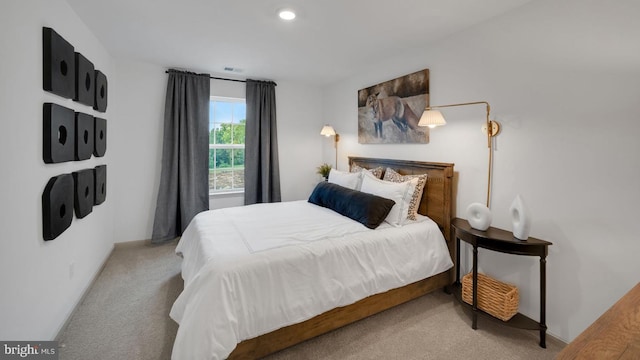 bedroom featuring carpet flooring and recessed lighting