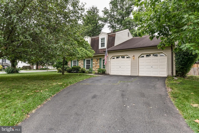 view of front of home with an attached garage, a shingled roof, driveway, stone siding, and a front yard