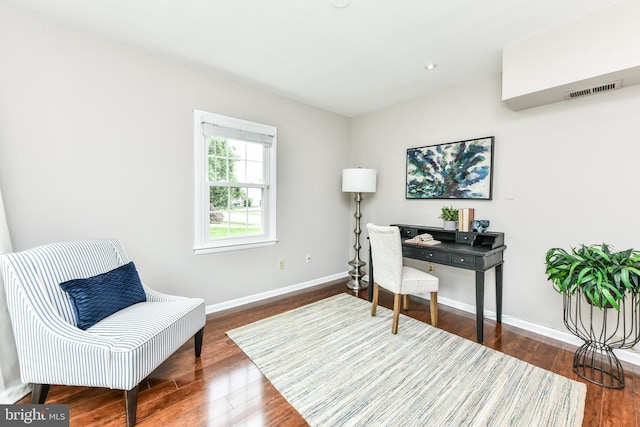 home office with recessed lighting, visible vents, baseboards, and wood finished floors