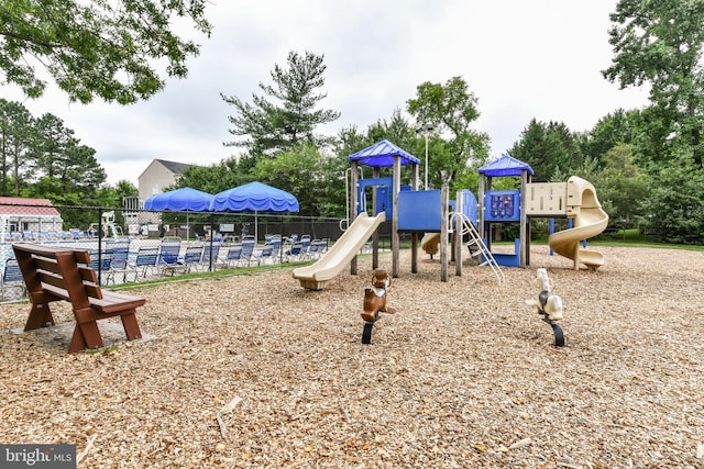 community playground featuring fence