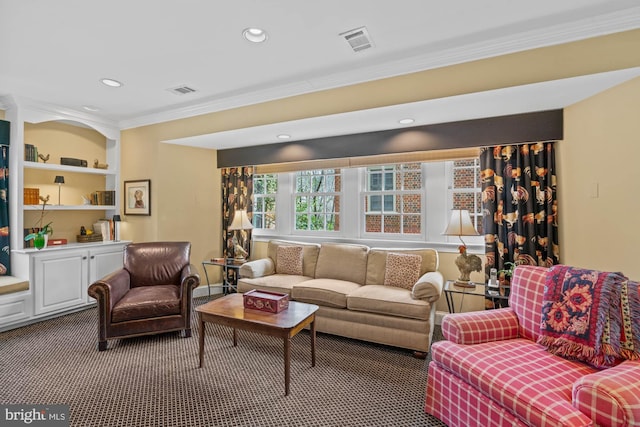 carpeted living area with built in features, recessed lighting, visible vents, and crown molding