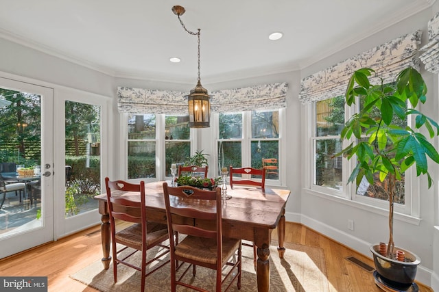 sunroom / solarium featuring visible vents