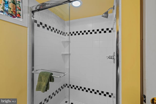 bathroom with a stall shower