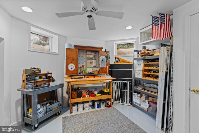 interior space with concrete flooring, ceiling fan, and recessed lighting