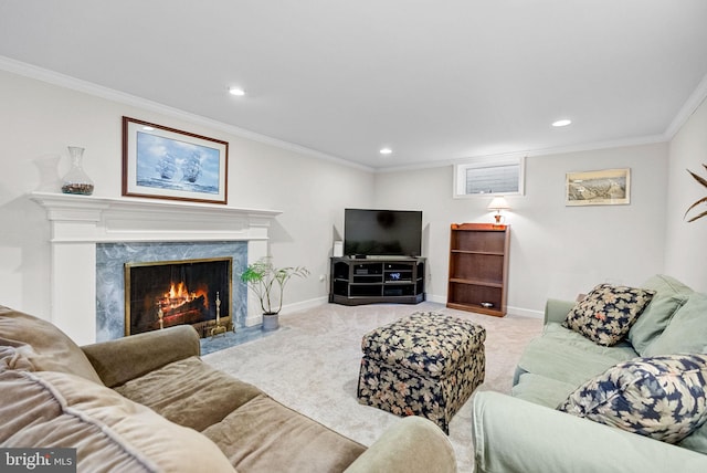 living room with ornamental molding, carpet, a fireplace, and baseboards