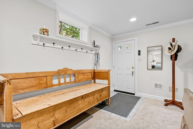 mudroom featuring ornamental molding, tile patterned flooring, visible vents, and baseboards