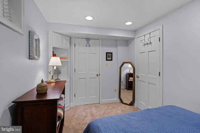 bedroom with recessed lighting, carpet flooring, and baseboards