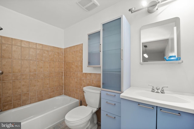 full bath featuring visible vents, vanity, and toilet