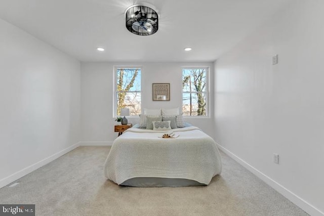 bedroom with recessed lighting, carpet flooring, and baseboards