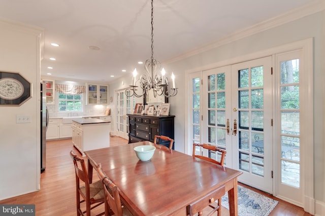 1911 Belle Haven Rd, Alexandria, VA 22307 - dining room with french doors, ornamental molding, light wood finished floors, a chandelier, and recessed lighting