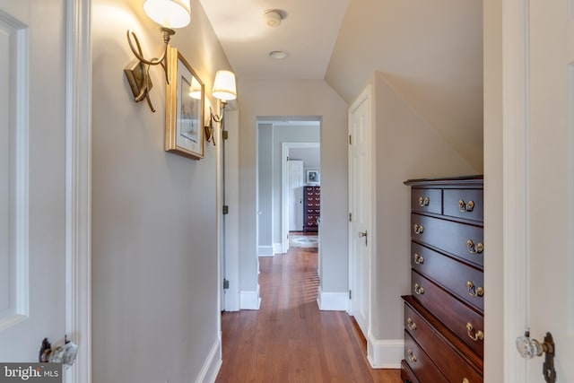 1911 Belle Haven Rd, Alexandria, VA 22307 - hallway with baseboards and dark wood-type flooring