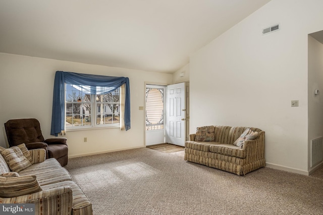 living area featuring lofted ceiling, carpet, visible vents, and baseboards