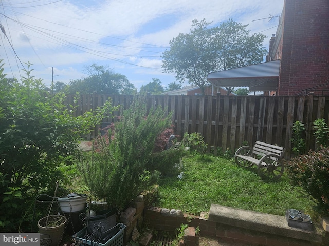 view of yard with fence