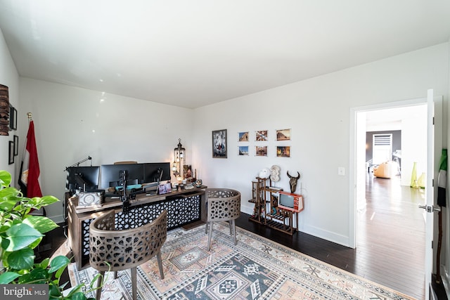 office featuring wood finished floors and baseboards