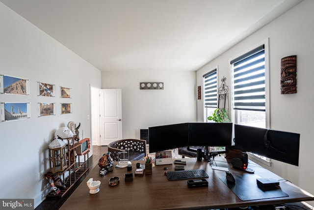 office space with wood finished floors