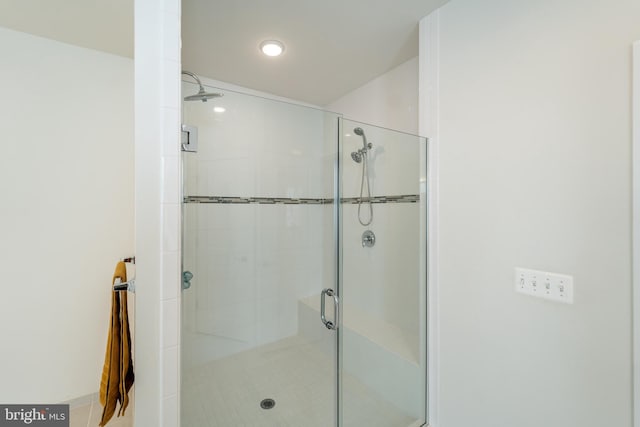 full bathroom featuring a stall shower