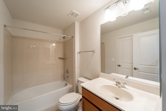 bathroom with toilet, tub / shower combination, vanity, and visible vents