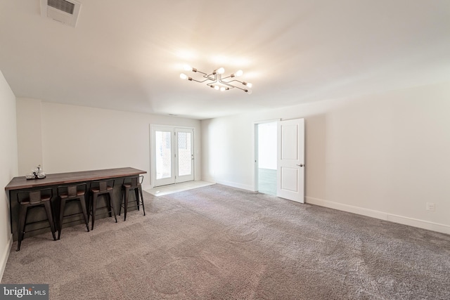 interior space with visible vents and baseboards