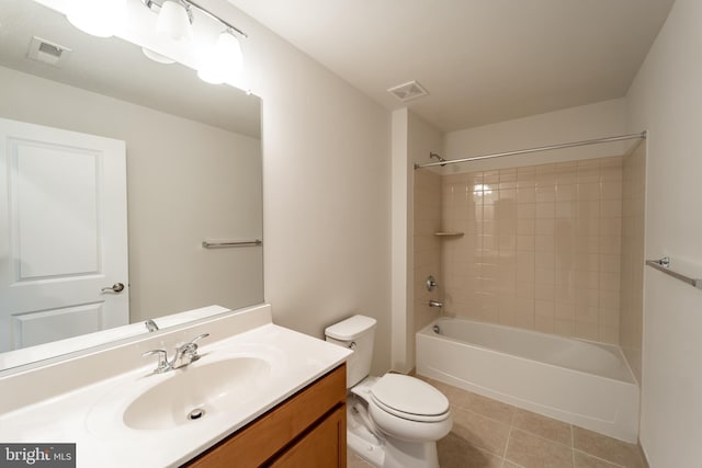 full bathroom with tile patterned flooring, visible vents, vanity, and toilet