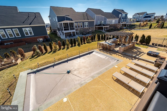 birds eye view of property with a residential view