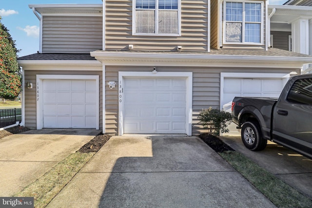 garage featuring driveway