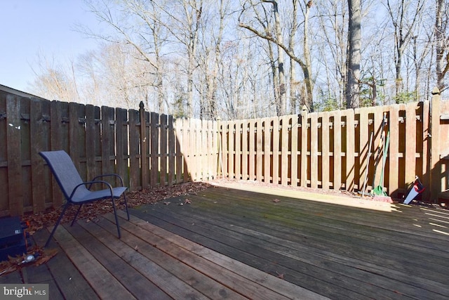 wooden terrace featuring fence private yard