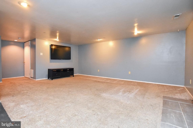 basement with visible vents and carpet floors