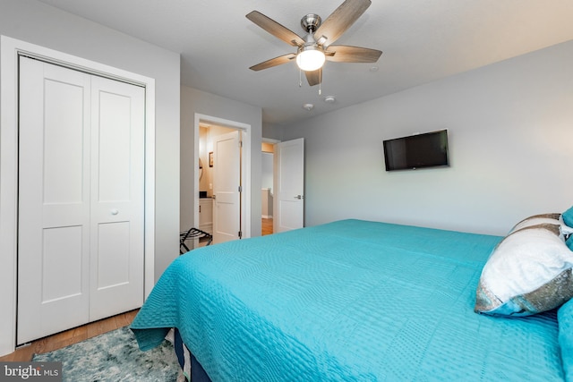 bedroom with a closet, a ceiling fan, and wood finished floors