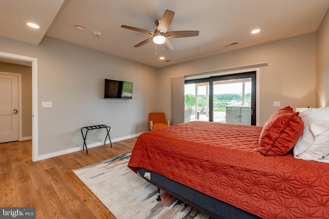 bedroom featuring recessed lighting, visible vents, light wood-style flooring, access to outside, and baseboards