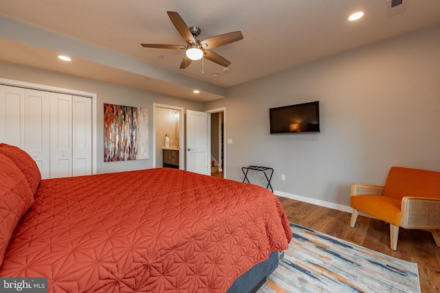 bedroom featuring recessed lighting, a closet, visible vents, wood finished floors, and baseboards