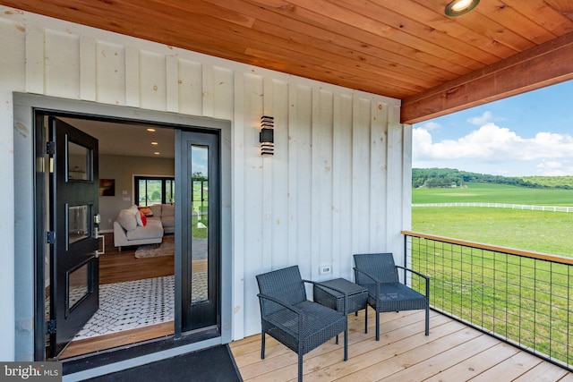 view of exterior entry with board and batten siding