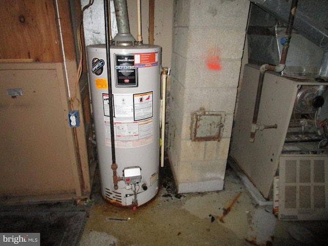 utility room with gas water heater